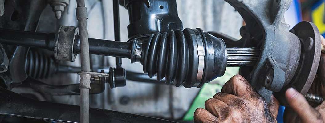 Decision tree for driveshaft repair vs replacement using checks for safety risk, tube damage, imbalance/runout, interface condition, and serviceable components